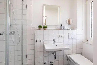 Ein Badezimmer in der Unterkunft Haus Treibholz Apartment 11