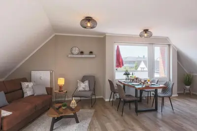Ein Sitzbereich in der Unterkunft Haus Treibholz Apartment 11
