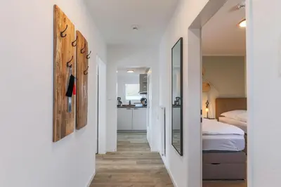 Ein Bett oder Betten in einem Zimmer der Unterkunft Haus Treibholz Apartment 7
