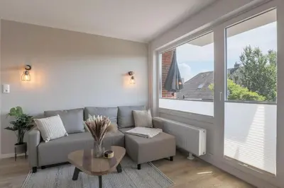Ein Sitzbereich in der Unterkunft Haus Treibholz Apartment 7