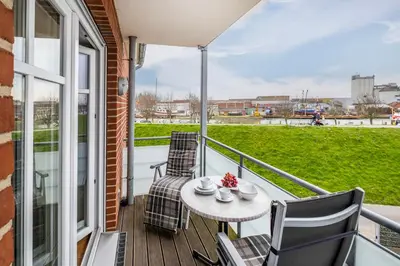 Ein Balkon oder eine Terrasse in der Unterkunft Haus Hafenresidenz Apartment 2 3