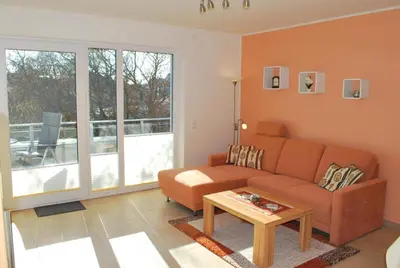 Ein Sitzbereich in der Unterkunft Haus Deichoase Apartment 3 1