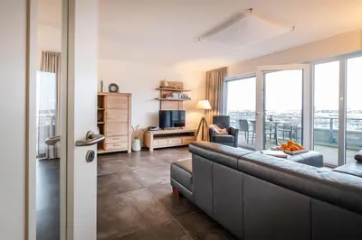 Ein Sitzbereich in der Unterkunft Haus Deichoase Apartment 3 3
