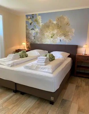 Ein Bett oder Betten in einem Zimmer der Unterkunft Büsumer Reethus Apartment 1 7