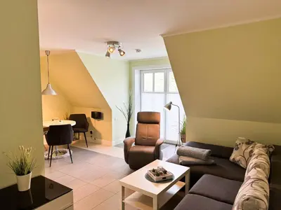 Ein Sitzbereich in der Unterkunft Büsumer Reethus Apartment 2 4