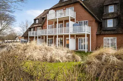 Ein Garten an der Unterkunft Büsumer Reethus Apartment 2 4