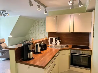 Küche/Küchenzeile in der Unterkunft Büsumer Reethus Apartment 2 4