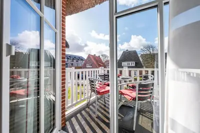 Ein Balkon oder eine Terrasse in der Unterkunft Büsumer Reethus Apartment 2 8 Beim Deichgraf
