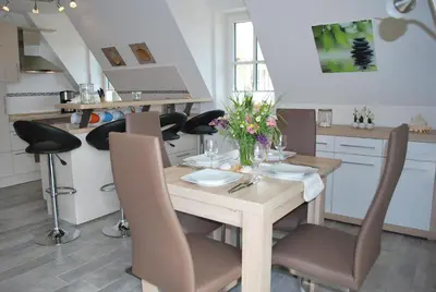 Ein Sitzbereich in der Unterkunft Büsumer Reethus Apartment 3 1 Dünengras