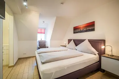 Ein Bett oder Betten in einem Zimmer der Unterkunft Büsumer Reethus Apartment 3 3