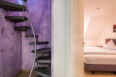 Ein Bett oder Betten in einem Zimmer der Unterkunft Büsumer Reethus Apartment 3 3
