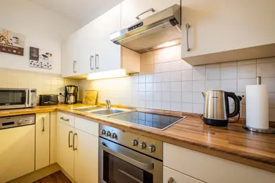 Küche/Küchenzeile in der Unterkunft Hochhaus Seeblick Appartement 42