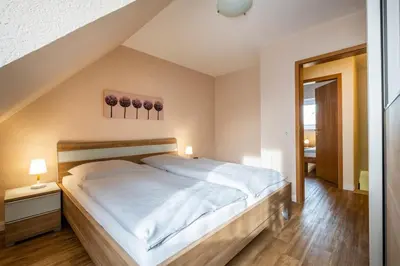 Ein Bett oder Betten in einem Zimmer der Unterkunft Haus Kähler 2 Wohnung 10