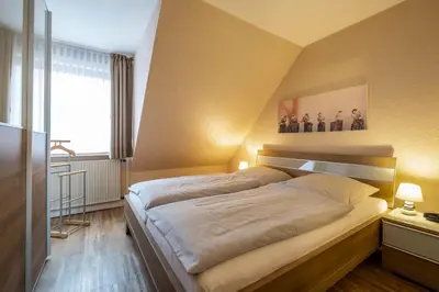 Ein Bett oder Betten in einem Zimmer der Unterkunft Haus Kähler 2 Wohnung 12