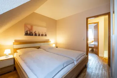 Ein Bett oder Betten in einem Zimmer der Unterkunft Haus Kähler 2 Wohnung 12