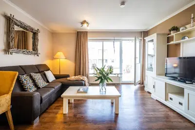 TV/Unterhaltungsangebot in der Unterkunft Haus Seemeile Wohnung 2 3