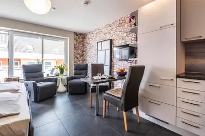 Ein Sitzbereich in der Unterkunft Haus Seemeile Wohnung 2 10
