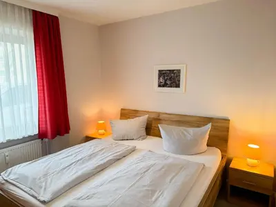 Ein Bett oder Betten in einem Zimmer der Unterkunft Haus Nordseeblick Wohnung 9