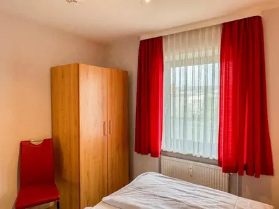 Ein Bett oder Betten in einem Zimmer der Unterkunft Haus Nordseeblick Wohnung 9