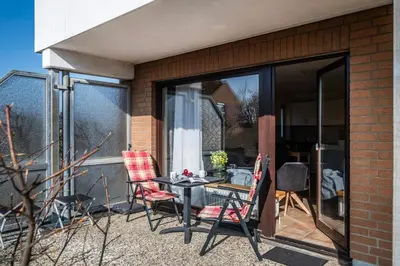Ein Patio oder anderer Außenbereich in der Unterkunft Haus Nordseeblick Wohnung 10