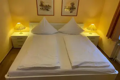 Ein Bett oder Betten in einem Zimmer der Unterkunft Haus Nordseeblick Wohnung 16