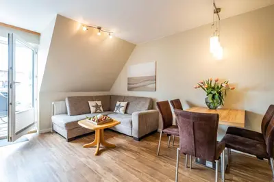 Ein Sitzbereich in der Unterkunft Haus Seemeile Wohnung 3 4