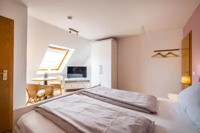Ein Bett oder Betten in einem Zimmer der Unterkunft Haus Seemeile Wohnung 3 4