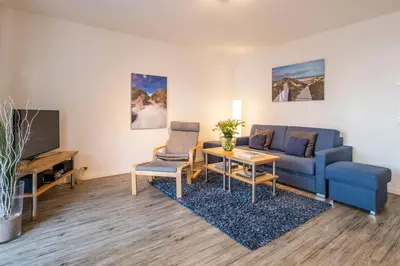 Ein Sitzbereich in der Unterkunft Haus Deichkieker Apartment 1 5 Nordlicht