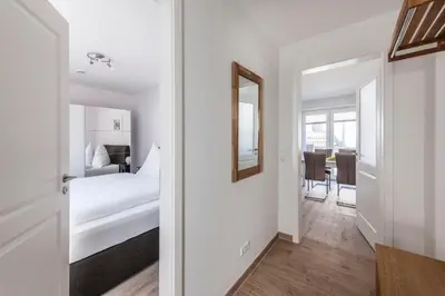 Ein Bett oder Betten in einem Zimmer der Unterkunft Haus Deichkieker Apartment 2 2 Deichpirat