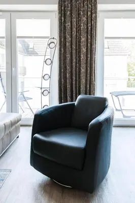 Ein Sitzbereich in der Unterkunft Haus Deichkieker Apartment 2 3 Deichkrone