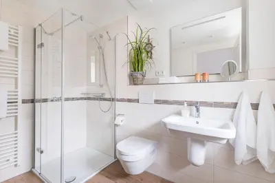 Ein Badezimmer in der Unterkunft Haus Deichkieker Apartment 2 4 Strandoase