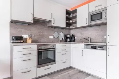 Küche/Küchenzeile in der Unterkunft Haus Deichkieker Apartment 2 4 Strandoase