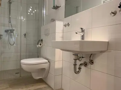 Ein Badezimmer in der Unterkunft Kleine Brise Apartment 1
