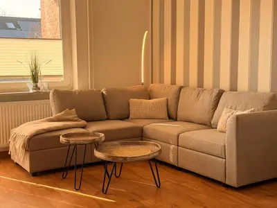 Ein Sitzbereich in der Unterkunft Kleine Brise Apartment 2