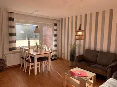 Ein Sitzbereich in der Unterkunft Kleine Brise Apartment 3