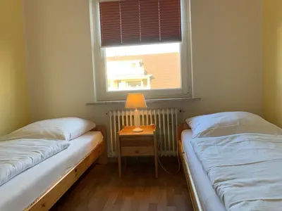 Ein Bett oder Betten in einem Zimmer der Unterkunft Kleine Brise Apartment 4