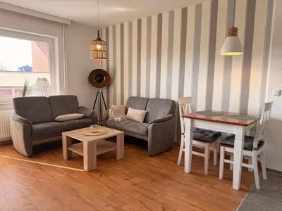 Ein Sitzbereich in der Unterkunft Kleine Brise Apartment 5