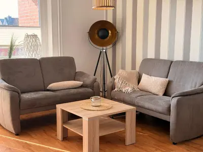 Ein Sitzbereich in der Unterkunft Kleine Brise Apartment 5