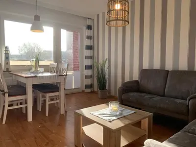 Ein Sitzbereich in der Unterkunft Kleine Brise Apartment 6
