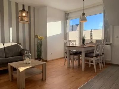 Ein Sitzbereich in der Unterkunft Kleine Brise Apartment 7