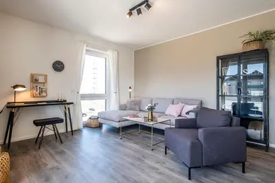 Ein Sitzbereich in der Unterkunft Haus Strandläufer Apartment 2 1 Sandbank