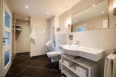 Ein Badezimmer in der Unterkunft Haus Seehafen Seehafen 2 2
