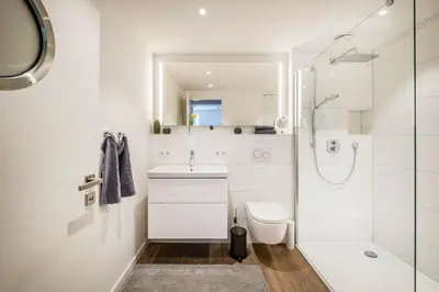 Ein Badezimmer in der Unterkunft Haus Hummerklippe Kleine Freiheit Apartment 2