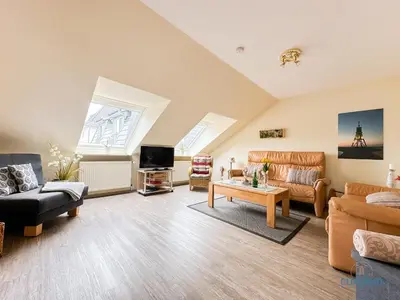 Ein Sitzbereich in der Unterkunft Ferienwohnung Seestern