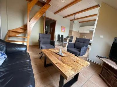 Ein Sitzbereich in der Unterkunft Modernisierte Ferienwohnung Friedrichskoog - Spitze, gegenüber Mutter-Kind-Klinik
