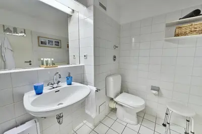 Ein Badezimmer in der Unterkunft Hohe Worth - 211