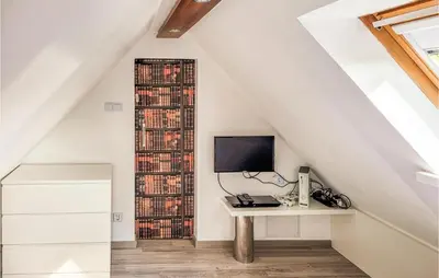 TV/Unterhaltungsangebot in der Unterkunft Cozy Apartment In Wurster Nordseeküste, With Wifi