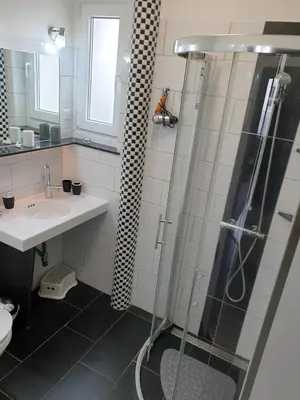 Ein Badezimmer in der Unterkunft Strandstraße 51a FeWo Kaptäns Suite