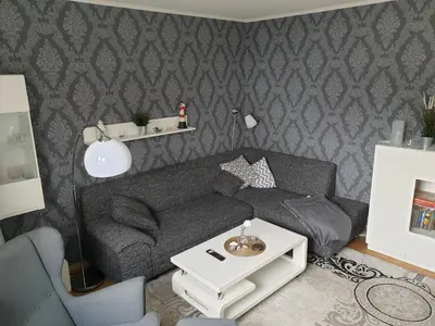 Ein Sitzbereich in der Unterkunft Strandstraße 51a FeWo Kaptäns Suite