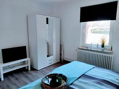Ein Bett oder Betten in einem Zimmer der Unterkunft Geesthaus